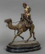 A late 19th century Austrian cold painted spelter group formed as an Arab gentleman on camel