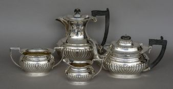 A George V silver four piece tea service, hallmarked Birmingham 1930,