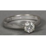 An 18 ct white gold diamond solitaire ring Of typical claw set form.