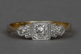 A 9 ct gold and platinum Art Deco three stone diamond ring CONDITION REPORTS: