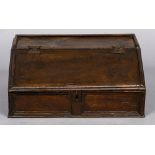 A 17th/18th century oak slope topped Bible box The galleried top above the sloping front with