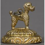 A 9 ct gold fob seal Mounted with a poodle. 2.5 cm high.