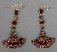 A pair of Georgian garnet set closed back pendant earrings The bottom link fan shaped.