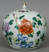 A Chinese porcelain ginger jar and cover Decorated overall with floral sprays. 23 cm high overall.