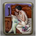 An enamel decorated cigarette case The front with a semi-clad young lady checking her makeup,