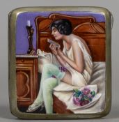 An enamel decorated cigarette case The front with a semi-clad young lady checking her makeup,