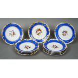 Eleven 19th century Limoges porcelain cabinet plates Each centrally painted with floral sprays