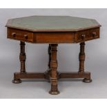 A Victorian walnut octagonal centre table The gilt tooled leather inset top above a deep frieze