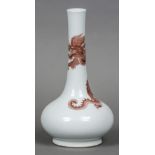 A Chinese porcelain vase Iron red decorated with a dragon,