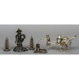 A small collection of Chinese items Including: a pair of silver pagoda form casters,