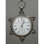 A silver cased pocket watch Decorated with pierced skulls (possibly Masonic),