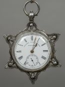 A silver cased pocket watch Decorated with pierced skulls (possibly Masonic),