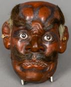 A late 19th century Japanese mask of Noh Of typical form. 18 cm high.