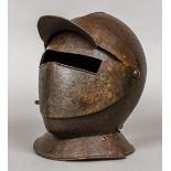 An antique armour helmet Of collared form, with moveable guard and visor. 26 cm high.