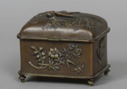 A small Japanese Meiji period patinated bronze casket Decorated with various birds and insects