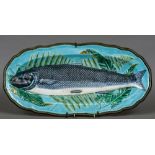 A 19th century Wedgwood majolica fish platter Moulded in low relief with a salmon resting on a bed