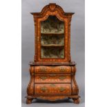 A 19th century Dutch marquetry cabinet on chest The domed top above the central glazed door