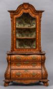 A 19th century Dutch marquetry cabinet on chest The domed top above the central glazed door