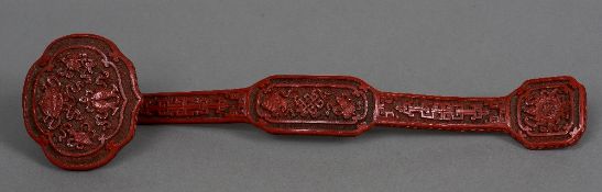 A Chinese rui sceptre Of typical form. 35 cm long.