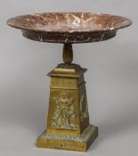 A 19th century gilt brass based tazza The stepped plinth base decorated with classical musical