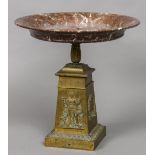 A 19th century gilt brass based tazza The stepped plinth base decorated with classical musical