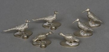 A set of six white metal menu holders modelled as game birds (6) CONDITION REPORTS: