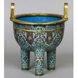 A Chinese cloisonne twin handled Ding censor Decorate with lotus strapwork and an archaic lappet