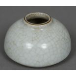 A Chinese crackle glaze ink pot Of squat beehive form. 7.5 cm diameter.