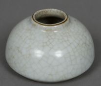 A Chinese crackle glaze ink pot Of squat beehive form. 7.5 cm diameter.