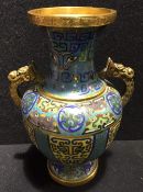 An 18th/19th century Chinese gilded copper cloisonne twin handled vase With typical archaic