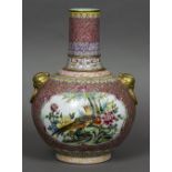 A large Chinese porcelain vase With twin gilt bird mask and ring handles,