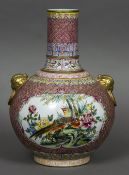 A large Chinese porcelain vase With twin gilt bird mask and ring handles,