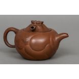 A Chinese Yixing teapot Of typical red/brown glaze, the lid set with a movable dragons head.