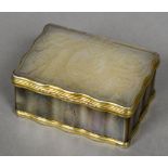 An 18th century Continental unmarked silver gilt mounted mother-of-pearl box The shaped hinged lid