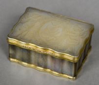 An 18th century Continental unmarked silver gilt mounted mother-of-pearl box The shaped hinged lid