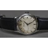 A Rolex Oyster Perpetual Stainless steel cased gentleman's wristwatch The signed ivory dial with