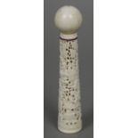 A 19th century Canton carved ivory Kendama game The plain ivory ball above the handle carved in the