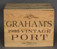 Graham's Vintage Port, 1985 Twelve bottles in old wooden case.