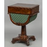 A 19th century mahogany work table The moulded rectangular top above a fitted frieze drawer with a