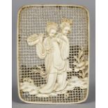 A 19th century Chinese finely carved ivory panel Decorated with two women amongst a landscape,