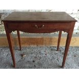 A George III mahogany side table The moulded rectangular top above a single frieze drawer and a