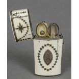 A 19th century white metal inlaid ivory etui The hinged cover enclosing various accoutrements,
