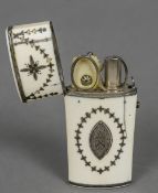 A 19th century white metal inlaid ivory etui The hinged cover enclosing various accoutrements,