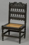 An 17th/18th century Colonial Dutch Indian carved ebony side chair With ornately pierced and turned