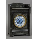 A Victorian Aesthetic mantle clock The blue painted enamelled dial with Arabic numerals and gong