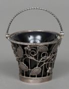 A George III silver basket salt, hallmarked London 1774,