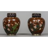 A pair of late 19th century cloisonne vases and covers Each of ovoid form,