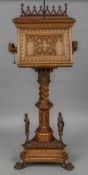 An Italian Gothic Revival specimen wood inlaid church lectern The rotating top section flanked by