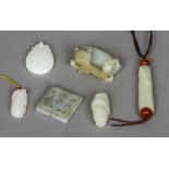 A collection of small jade items Including: pendants,