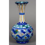 A Cantagalli Iznik pattern vase With flared neck and bulbous main body. 18.5 cm high.